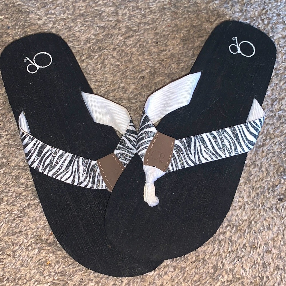 OP ZEBRA FLIP FLOPS